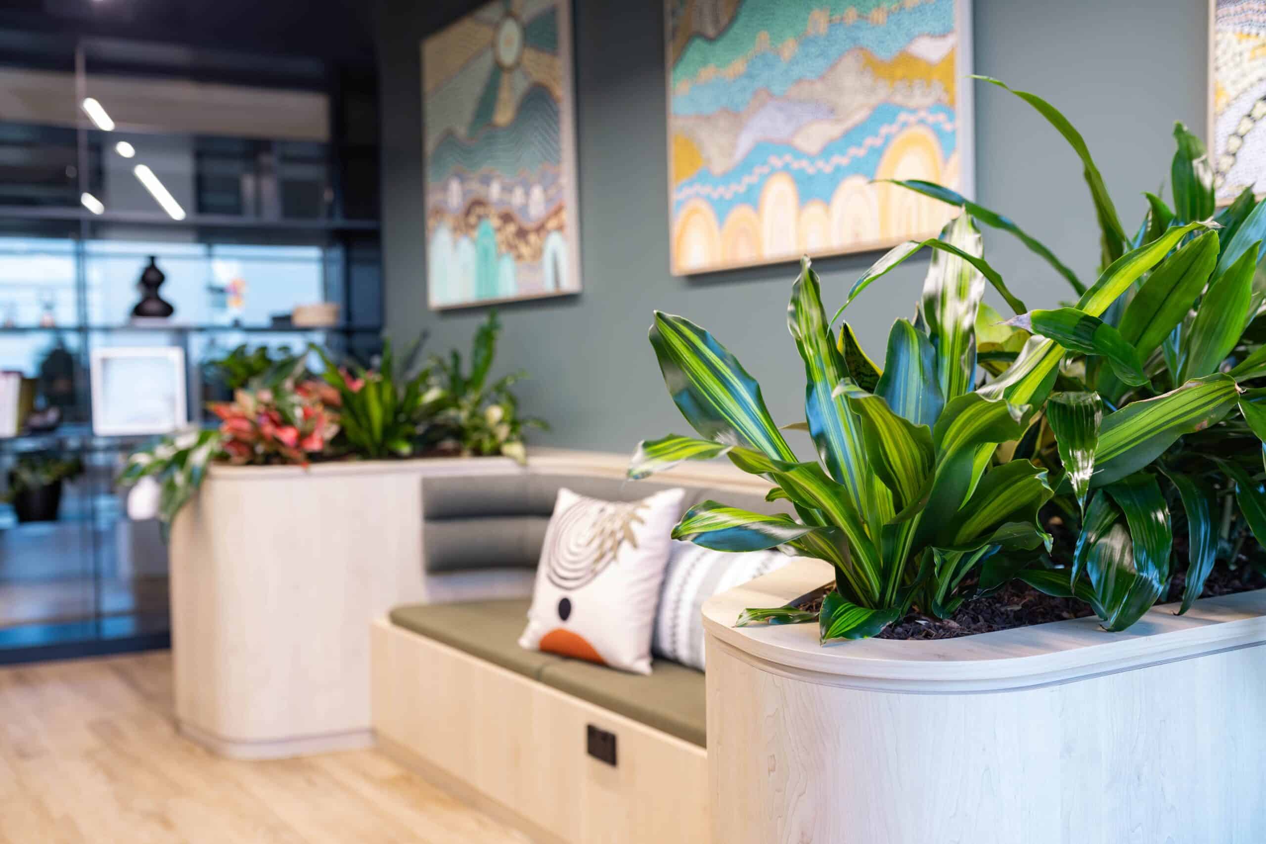 A Seating Booth Surrounded by Plants 2