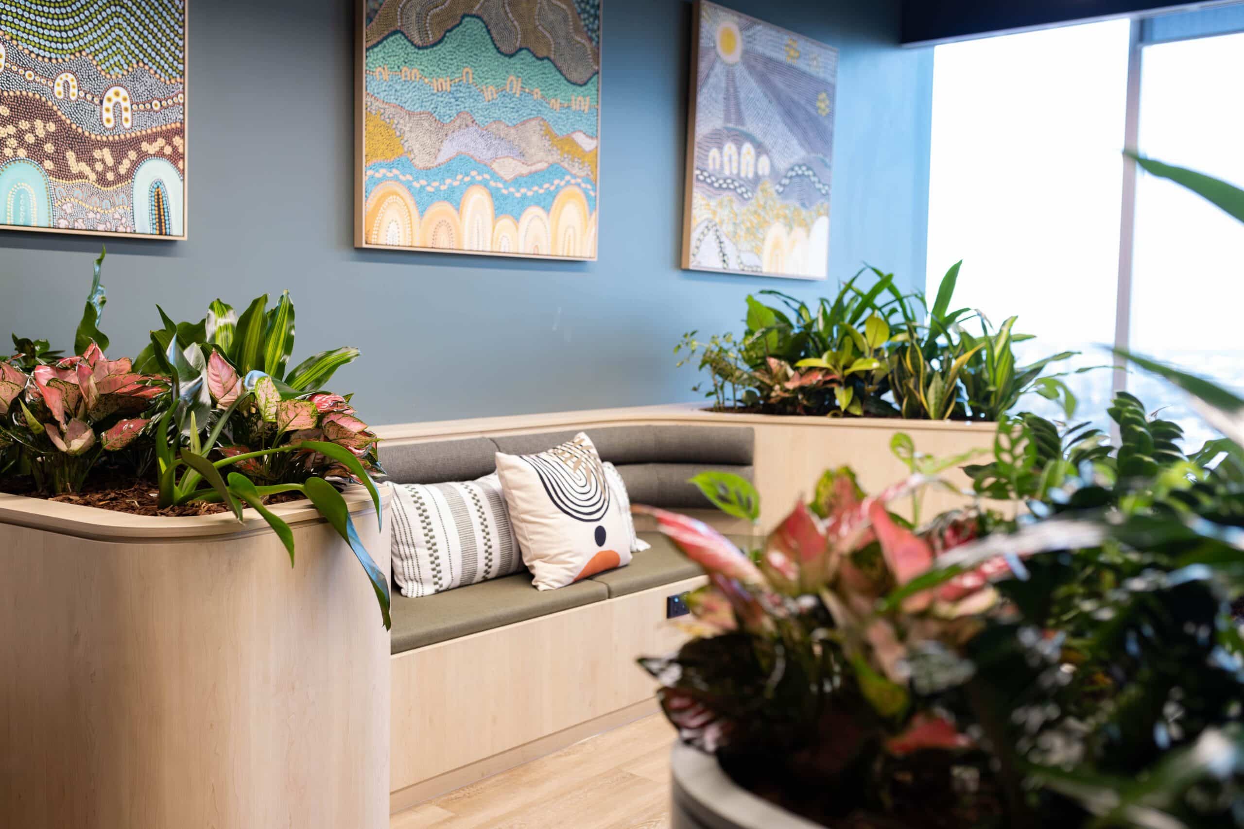 A Seating Booth Surrounded by Plants
